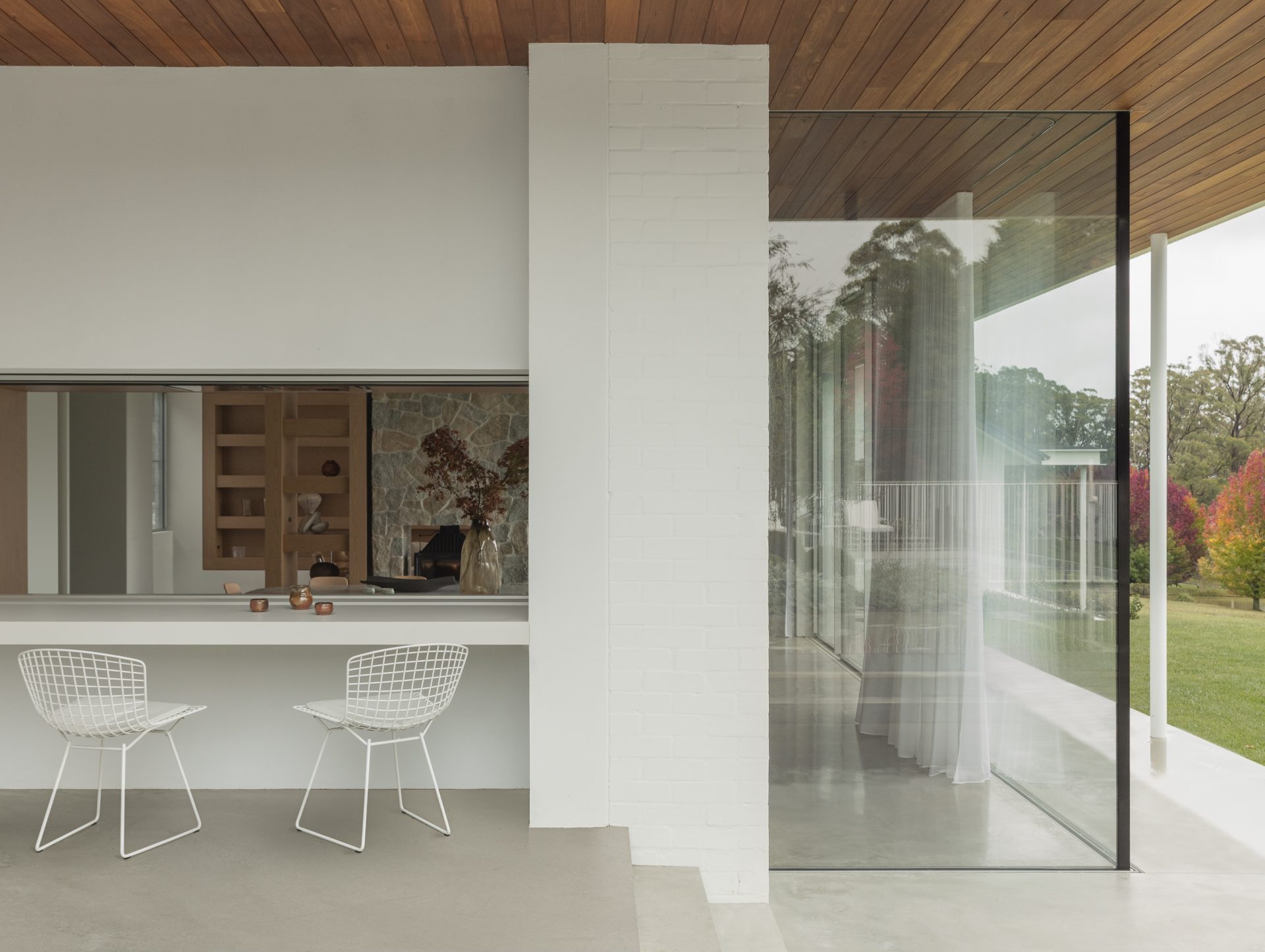 Kitchen and dining space opening to the outdoor terrace at Melody House